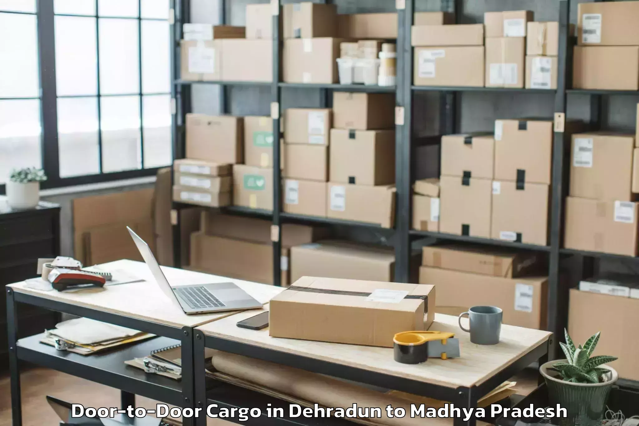 Book Dehradun to Karera Door To Door Cargo Online